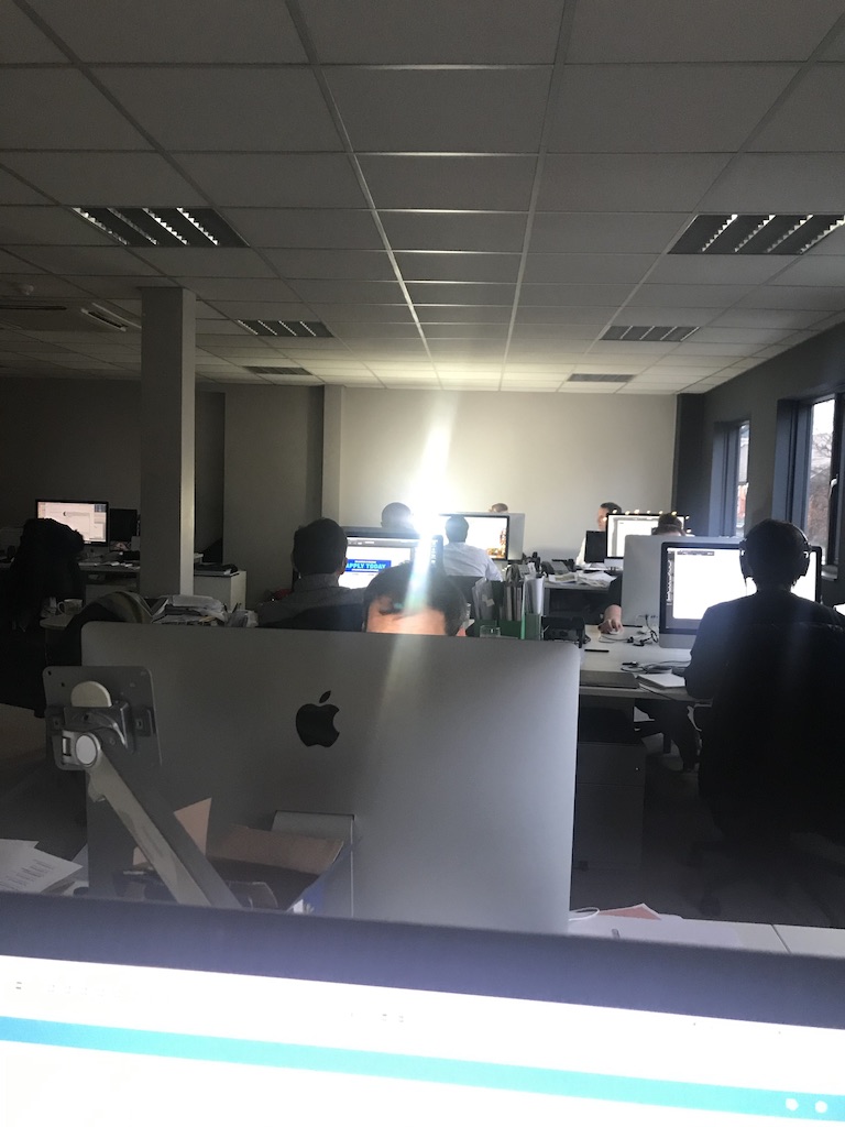 Photograph of employees at desks in the Ranelagh office for Originate Creative Agency